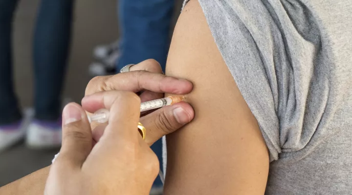 Vaccines given to teen.