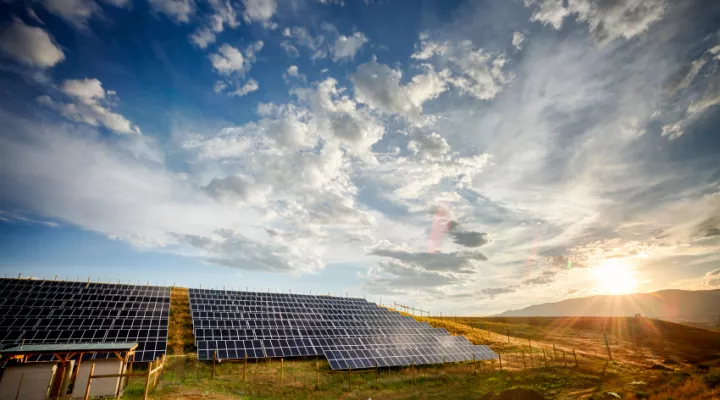 Shot of solar panels and sunrise