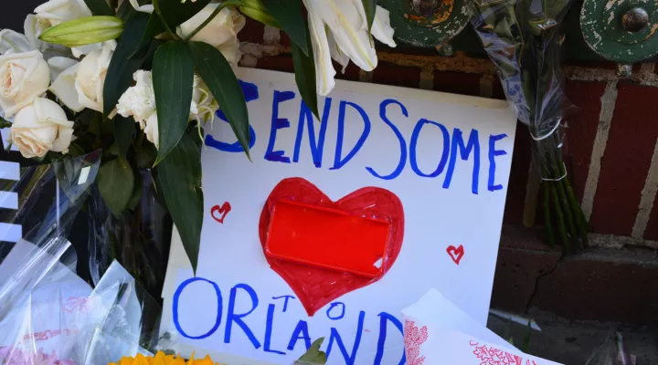 Sign reading "Send some love to Orlando"