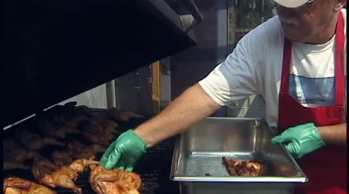 Cook preparing BBQ