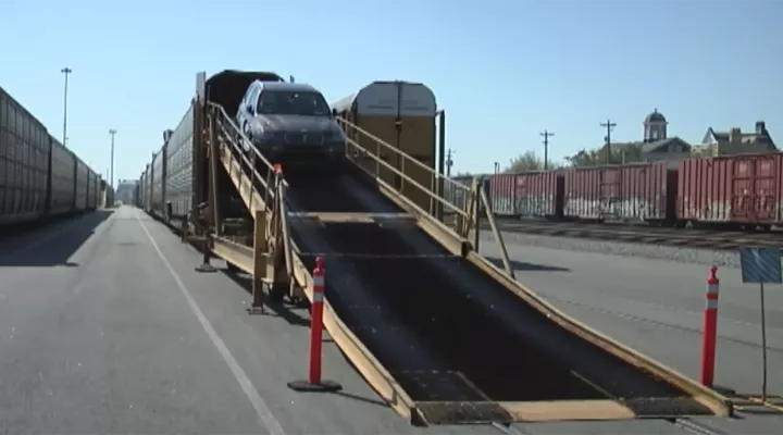 BMW rolling out of train