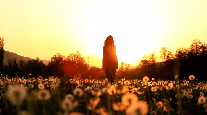 Woman walking in a rural area