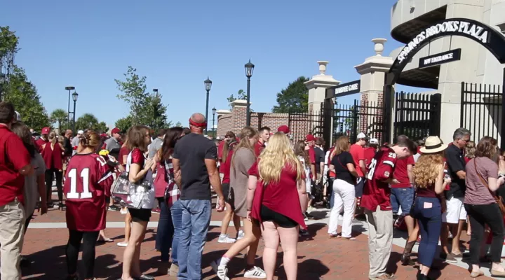 fans walk into Williams Brice Stadium