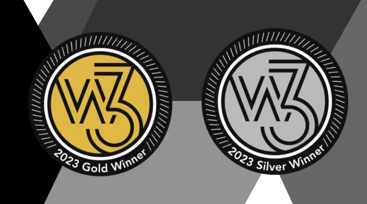 gold and silver w3 award seals with geometric shape background