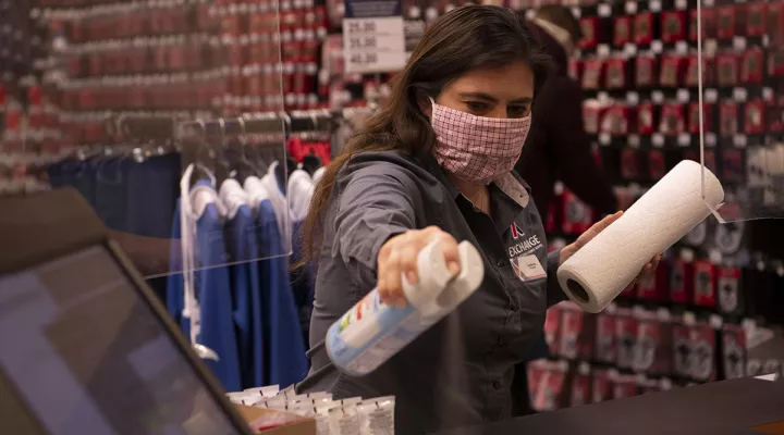 LeeAnna Murphy, disinfects her work area at Spangdahlem Air Base, Germany, April 30, 2020. 