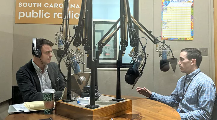 Gavin Jackson (l) speaks with Andy Brown in the South Carolina Public Radio studios on Monday, December 3, 2018.