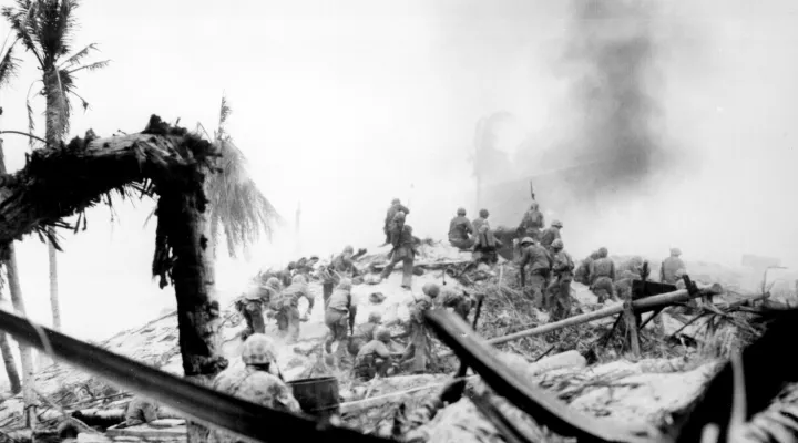 Tarawa, Kiribati - U.S. Marines storm Tarawa in the Gilbert Islands. The battle (November 20-23, 1943) was one of the bloodiest of WWII. 