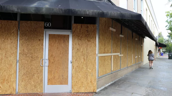Businesses boarded up on King Street in Charleston