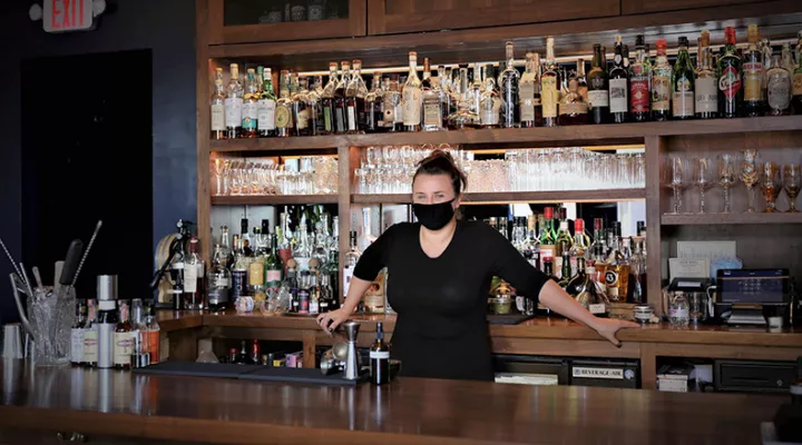 Bar manager Megan Deschaine is grateful Doar Bros. on Meeting Street in Charleston is back open. She lost her job seven months ago when the bar was forced to shut down due to the pandemic.