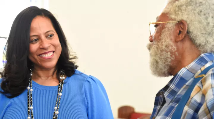 State Sen. Mia McLeod, left, stands in the sanctuary of Shiloh Baptist, her family's church, talking with Rev. Coley Mearite, Tuesday, June 1, 2021, in Bennettsville, S.C. In her challenge of Gov. Henry McMaster, the Columbia Democrat is the first Black woman to seek South Carolina's top job. (AP Photo/Meg Kinnard)