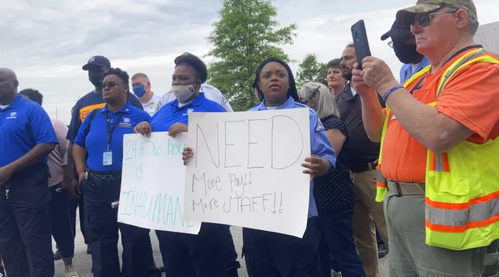 Employees of the South Carolina Department of Juvenile Justice gather at the agency's Broad River Road complex in Columbia, S.C., to protest poor working conditions on Friday, June 4, 2021. Correctional officers say that low pay and short staffing are creating safety issues for both employees and children locked up at the facility. (AP Photo/Michelle Liu)