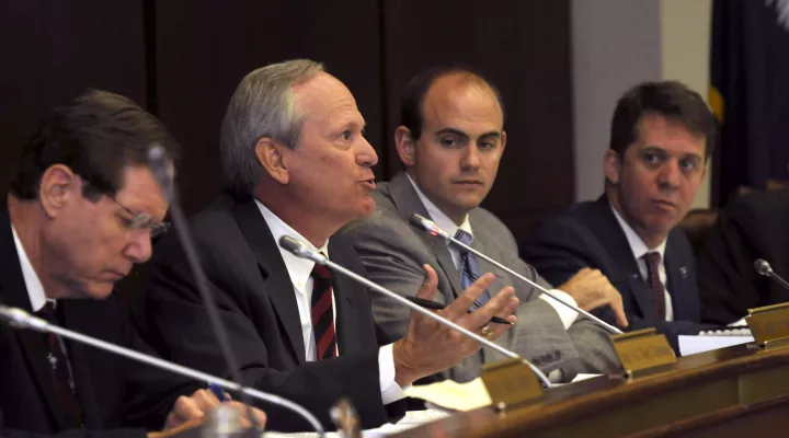 FILE - State Rep. Jim Harrison, second left, speaks at a House subcommittee meeting in Columbia, S.C. Tuesday, Dec. 1, 2009. (AP Photo/Virginia Postic)