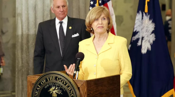 FILE - In this April 13, 2021, file photo, South Carolina Education Superintendent Molly Spearman speaks during a news conference as  South Carolina Gov. Henry McMaster in Columbia, S.C. South Carolina students will again be required to wear masks on school buses starting Monday, Aug. 30, 2021, as COVID-19 cases among children and students are rising rapidly. Spearman said the delta variant of COVID-19 appears to be spreading quickly in children and more must be done to keep students safe and schools open…