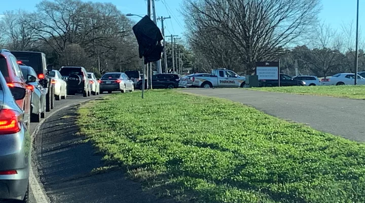 A view from the end of the line at a COVID testing site in Rock Hill Friday morning. This was the line to the waiting area. From here, vehicles queued up along the side of Eden Terrace for a half-mile. Not shown: the lines snaking around the parking lot where the testing tents were. 