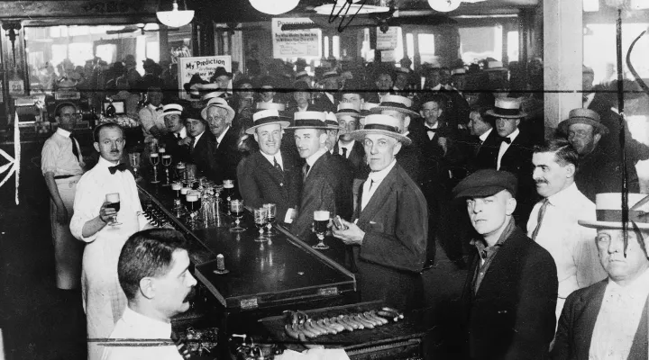  Interior of a crowded bar moments before midnight, June 30, 1919, when wartime prohibition went into effect New York City.