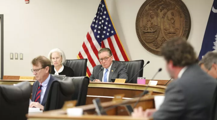 South Carolina Education Committee Chairman Greg Hembree. R-Little River, listens during a meeting discussing a bill banning transgender students from playing girl's sports in Columbia, South Carolina, on Wednesday, March 23, 2022. (AP Photo/Jeffrey Collins)