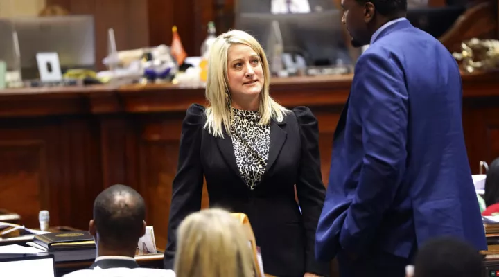 South Carolina Rep Ashley Trantham, R-Pelzer, talks to other lawmakers during a debate on the bill she sponsored to ban transgender athletes from girls' and women's public school and college sports teams on Tuesday, April 5, 2022, in Columbia, S.C. (AP Photo/Jeffrey Collins)