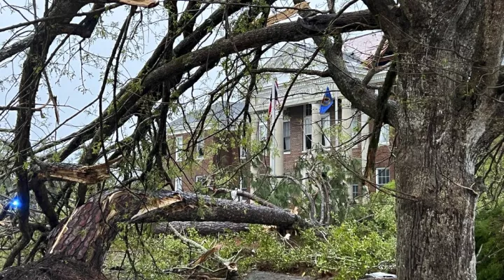 The Bryan County Courthouse was damaged and trees broken in half, Tuesday, April 5, 2022, after a storm passed through the city of Pembroke, Ga., 30 miles from Savannah, Ga. (AP Photo/Lewis M. Levine)