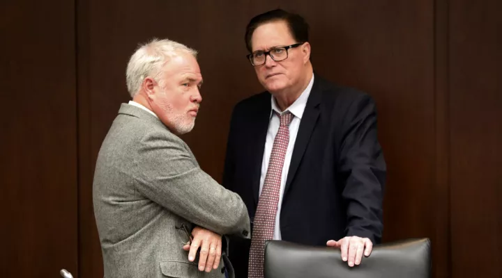 South Carolina Sen. Danny Verdin, R-Laurens, left, and House Speaker Jay Lucas, R-Hartsville, speak before a meeting of the College and University Trustee Screening Commission on Tuesday, March, 30, 2022, in Columbia, S.C. (AP Photo/Jeffrey Collins).