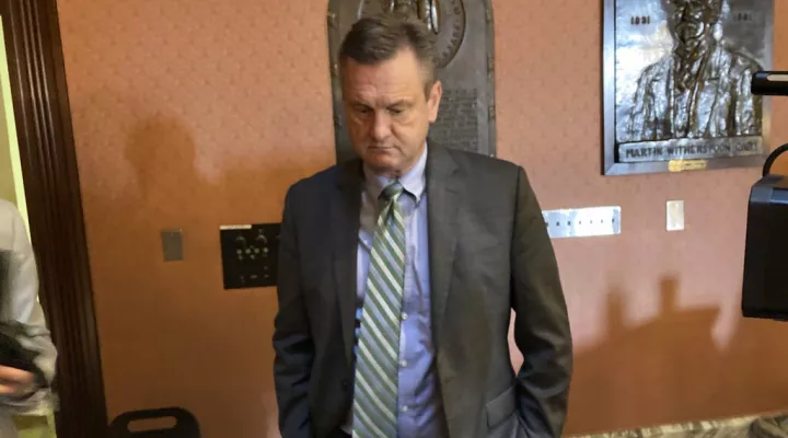 South Carolina Sen. Tom Davis waits to talk to reporters after a procedural ruling killed his medical marijuana bill in the House on Wednesday, May 4, 2022, in Columbia, S.C. (AP Photo/Jeffrey Collins)