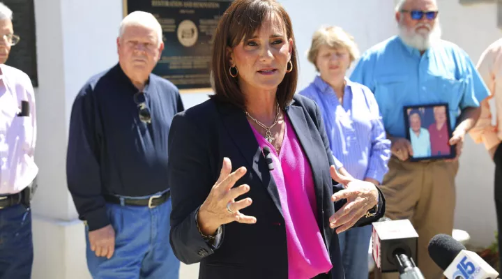 Attorney Lori Murray speaks at a news conference, Monday, May 9, 2022, in Kingstree, S.C. Murray asked prosecutors to release information about why the man charged in the killings of two sisters in October 2010 has been set free after being found incompetent to stand trial. (AP Photo/Jeffrey Collins)