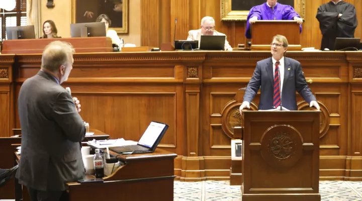 South Carolina Sen. Brad Hutto, D-Orangeburg, left, asks questions to Sen. Richard Cash, R-Powdersville, right, during a debate over transgender athletes playing sports on Tuesday, May 3, 2022, in Columbia, S.C. (AP Photo/Jeffrey Collins)