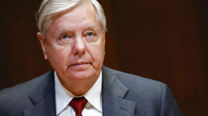 FILE - Sen. Lindsey Graham, R-S.C., listens during a hearing on the fiscal year 2023 budget for the FBI in Washington, on May 25, 2022. Attorneys for Graham said in a court filing on July 13, he wasn't trying to interfere in Georgia's 2020 election when he called state officials to ask them to reexamine certain absentee ballots after President Donald Trump's narrow loss to Democrat Joe Biden. (Ting Shen/Pool Photo via AP, File)