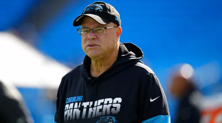 FILE - Carolina Panthers owner David Tepper watches during warm ups before an NFL football game against the New England Patriots, Sunday, Nov. 7, 2021, in Charlotte, N.C. Tepper’s real estate company has promised to pay more than $82 million to creditors over an abandoned practice facility project in Rock Hill under a new plan proposed Thursday, Aug. 11, 2022. (AP Photo/Jacob Kupferman, File)