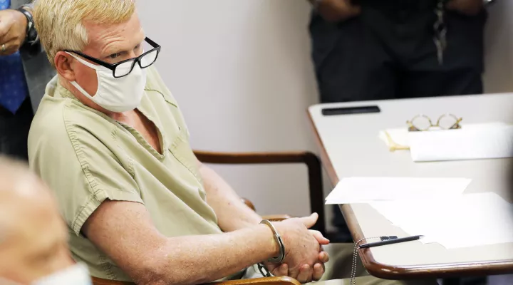 FILE - Alex Murdaugh sits during his bond hearing Thursday, Sept. 16, 2021, in Varnville, S.C.For a century, the Murdaughs have quietly steered much of the legal world in this corner of the state, by running the prosecutor’s office and a large civil law firm.  Then, in June, Murdaugh’s wife, Maggie, and son Paul were killed at the family’s sprawling estate. Six investigations are underway, over the killings, stolen money, death coverups and a Sept. 4 shooting in which a bullet grazed Murdaugh’s head on a l…