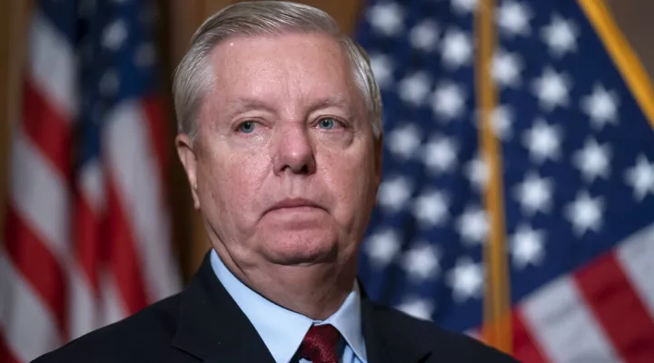 FILE - Sen. Lindsey Graham, R-S.C., the ranking member of the Senate Budget Committee, waits to speak to reporters following bi-partisan passage of the Ending Forced Arbitration of Sexual Assault and Sexual Harassment Act, at the Capitol in Washington, Feb. 10, 2022. Graham is among a handful of Republicans declaring a willingness to back President Joe Biden's nominee to the Supreme Court. Graham has been promoting U.S. District Judge Michelle Childs as his preferred choice to replace the retiring Justice …