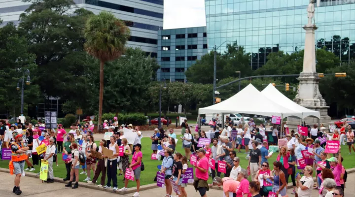 Protesters gather outside the state house in opposition to a proposed abortion ban debated Tuesday, Aug. 30, 2022 by the South Carolina House of Representatives in Columbia, S.C. (AP Photo/James Pollard)