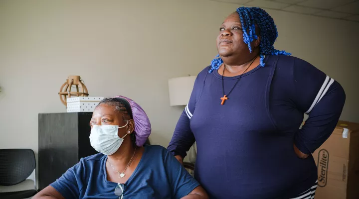 Margaret Davis (left) and Delisa Williams (right) became acquainted when they moved into the Salvation Army Center of Hope shelter just outside uptown Charlotte, North Carolina. Both women receive federal benefits, but the monthly amounts aren’t enough for them to be able to rent an apartment. (Logan Cyrus for KHN)&#13;