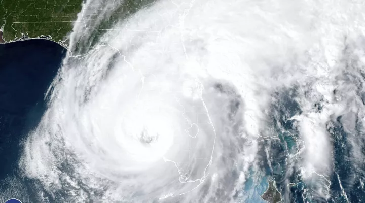 This satellite image taken at 3:06 p.m. EDT and provided by NOAA shows Hurricane Ian making landfall in southwest Florida near Cayo Costa, Fla., on Wednesday, Sept. 28, 2022, as a catastrophic Category 4 storm. (NOAA via AP)