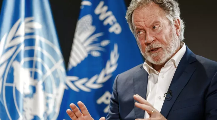 FILE - World Food Program Executive Director David Beasley speaks during an interview with The Associated Press at the WFP headquarters in Rome, Nov. 2, 2021. Beasley announced Saturday, Dec. 17, 2022, that he will step down from his role as executive director of the U.N. World Food Program, ending a six-year term heading the world’s largest humanitarian organization. (AP Photo/Domenico Stinellis, File)