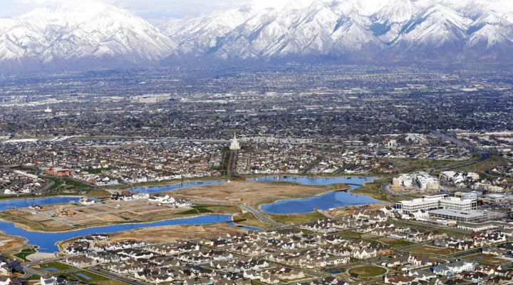 FILE - Homes in suburban Salt Lake City are shown, April 13, 2019. According to estimates released Thursday, Dec. 22, 2022, by the U.S. Census Bureau, the U.S. population grew by 1.2 million people this year, with growth largely driven by international migration, and the nation now has 333.2 million residents. (AP Photo/Rick Bowmer, File)
