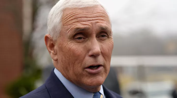 FILE - Former Vice President Mike Pence speaks with reporters Dec. 6, 2022, at Garden Sanctuary Church of God in Rock Hill, S.C. The executive director of former U.N. Ambassador Nikki Haley's political action committee is leaving to help run PAC efforts for Pence.(AP Photo/Meg Kinnard, File)