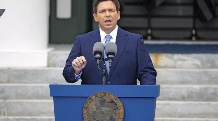 FILE - Florida Gov. Ron DeSantis speaks after being sworn in to begin his second term during an inauguration ceremony outside the Old Capitol Jan. 3, 2023, in Tallahassee, Fla. DeSantis may be months away from publicly declaring his presidential intentions, but his potential rivals aren’t holding back. A half dozen high-profile Republican White House prospects have begun courting top political operatives in states like New Hampshire and Iowa. (AP Photo/Lynne Sladky, File)