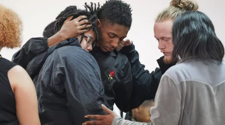 People comfort each other after a vigil for a group of Americans recently kidnapped in Mexico, at Word of God Ministries in Scranton, S.C., Wednesday, March 8, 2023. Two of the four Americans, all from South Carolina, were killed after being caught in a deadly shootout while traveling last week to Matamoros for one of them to get cosmetic surgery. (AP Photo/Sean Rayford)