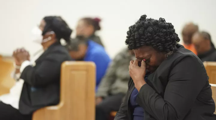 Elder Sharon Hammond prays during a vigil for a group of Americans recently kidnapped in Mexico, at Word of God Ministries in Scranton, S.C., Wednesday, March 8, 2023. Two of the four Americans, all from South Carolina, were killed after being caught in a deadly shootout while traveling last week to Matamoros for one of them to get cosmetic surgery. (AP Photo/Sean Rayford)