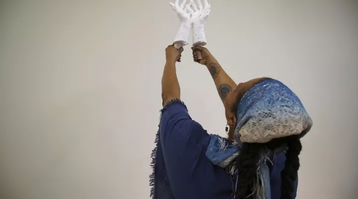 Crystal Kornickey holds up casts of her hands in a studio at the Gibbes Museum of Art in Charleston, S.C., on Thursday, Feb. 16, 2023. She is one of 36 people whose hands will be cast in bronze for a memorial to the likely enslaved people discovered in an unmarked burial ground. In recent decades, advances in DNA research have allowed scientists to use ancient remains and peer into the lives of long-dead people. In Charleston, that's meant tracing some of the African roots that were cut off by slavery. (AP…