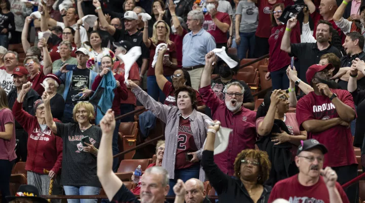 South Carolina fans celebrate after defeating Maryland in an Elite 8 college basketball game of the NCAA Tournament in Greenville, S.C., Monday, March 27, 2023. (AP Photo/Mic Smith)