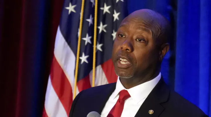 FILE - Sen. Tim Scott, R-S.C., gives a speech at a Black History Month dinner hosted by the Charleston County GOP on Feb. 16, 2023, in Charleston, S.C. Scott is taking the next official step toward a bid for president in 2024. The Republican is set to announce the formation of an exploratory committee, according to a person familiar with his plans who spoke with The Associated Press, Tuesday, April 11, 2023, on the condition on anonymity so as not to get ahead of the official announcement. (AP Photo/Meg Ki…