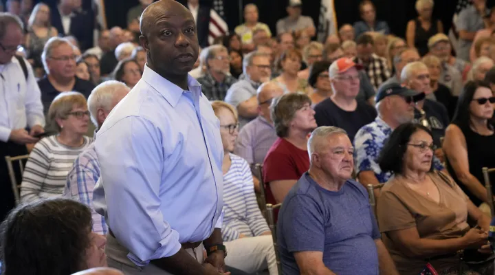 Republican presidential candidate Sen. Tim Scott, R-S.C., waits to speak a town hall meeting, Thursday, July 27, 2023, in Ankeny, Iowa. (AP Photo/Charlie Neibergall)