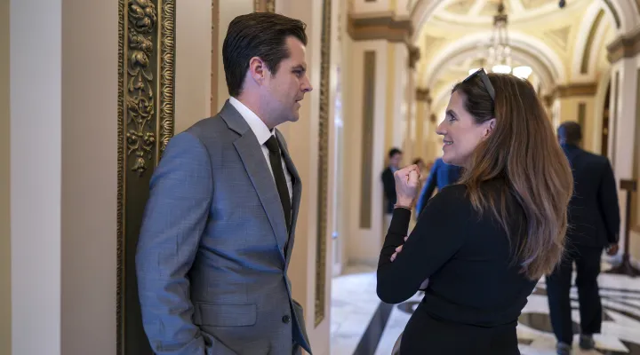 Rep. Matt Gaetz, R-Fla., and Rep. Nancy Mace, R-S.C., right, confer in the hallway near the House chamber just after a stopgap spending bill advanced on a procedural vote but with final passage uncertain, at the Capitol in Washington, Friday, Sept. 29, 2023. (AP Photo/J. Scott Applewhite)