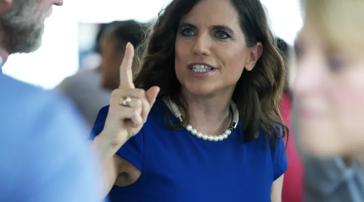 U.S. Rep. Nancy Mace arrives at her election night party following the close of polls in South Carolina's primary elections on Tuesday, June 14, 2022, in Mount Pleasant, S.C. Mace is facing a challenger, former state Rep. Katie Arrington, who has the backing of former President Donald Trump. (AP Photo/Meg Kinnard)