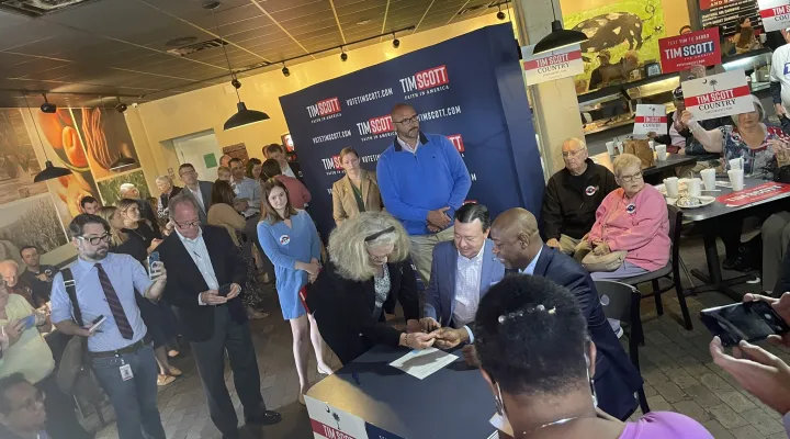  U.S. Sen. Tim Scott, R-S.C., right, files on Monday, Oct. 16, 2023, for South Carolina's Republican presidential primary on Feb. 24, 2024. Next to Scott is Drew McKissick, chairman of the S.C. GOP.