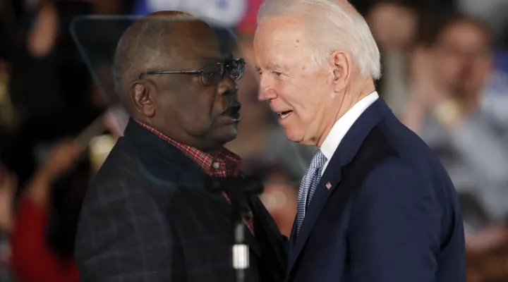 Then-Democratic presidential candidate Joe Biden talks to Rep. James Clyburn, D-S.C., at a primary night election rally in Columbia, S.C., Feb. 29, 2020 after winning the South Carolina primary. President Biden has frequently referenced the critical role South Carolina played in his nomination. He points to his decades-long relationship with the state whose Black voters handed him a major win at a desperate time for his Democratic campaign. But, in recent interviews with The Associated Press, some Black vo…