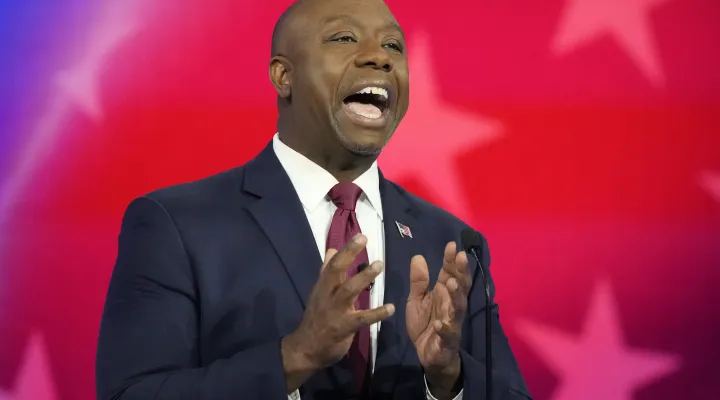 Republican presidential candidate Sen. Tim Scott, R-S.C., speaks during a Republican presidential primary debate hosted by NBC News, Wednesday, Nov. 8, 2023, at the Adrienne Arsht Center for the Performing Arts of Miami-Dade County in Miami. (AP Photo/Rebecca Blackwell)