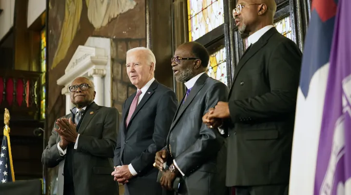 President Joe Biden arrives to deliver remarks, Monday, Jan. 8, 2024, at Mother Emanuel AME Church in Charleston, S.C., where nine worshippers were killed in a mass shooting by a white supremacist in 2015. From left are Rep. Jim Clyburn, D-S.C., Biden, Bishop Samuel L. Green, Sr., Pastor, 7th District AME Church and Reverend Eric S.C. Manning, Head Pastor, Mother Emanuel AME Church. (AP Photo/Stephanie Scarbrough)