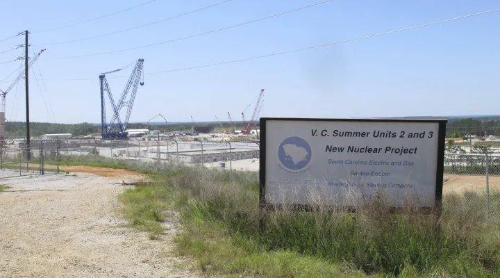 FILE - Construction is well underway for two new nuclear reactors at the V.C. Summer Nuclear Station in Jenkinsville, S.C. on Monday, April 9, 2012. A judge threw out criminal charges Wednesday, Aug. 2, 2023, against former Westinghouse executive Jeffrey Benjamin for lying about the project's progress before it fell apart, but also left open the possibility federal prosecutors can indict Benjamin again. (AP Photo/Jeffrey Collins, File)
